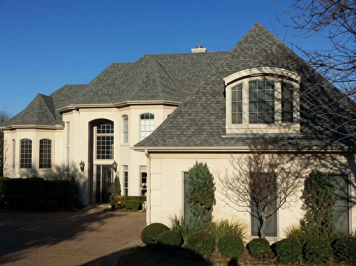 Luxury multi-gable shingle roof on an estate home in Central Texas